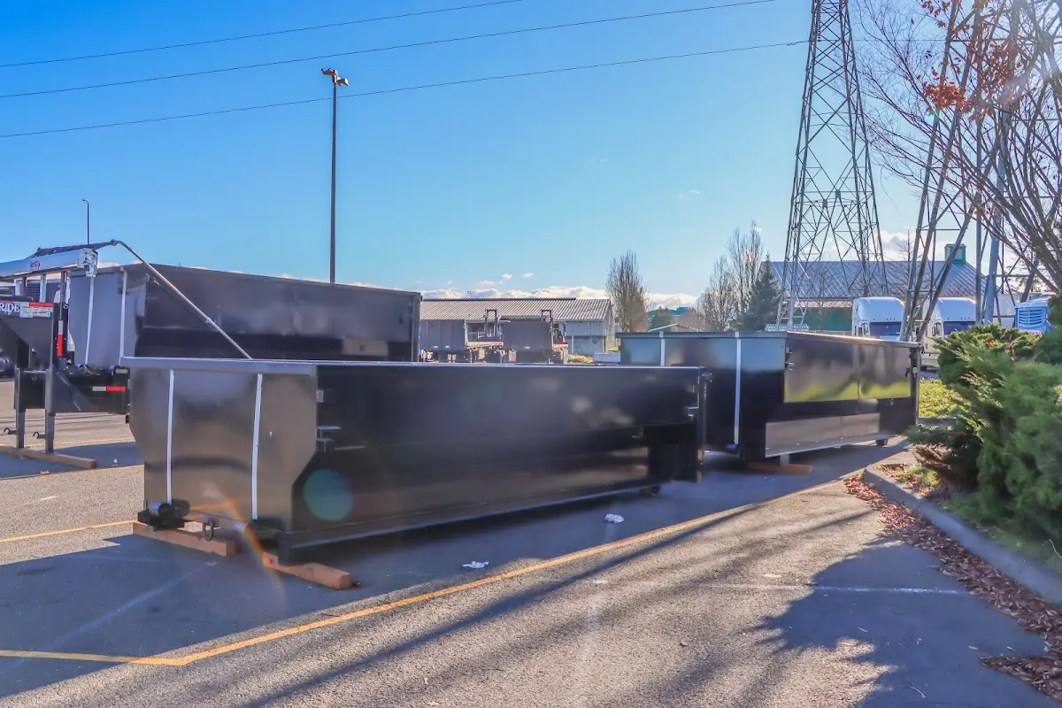 Roll-off dumpster ready for waste disposal at job site for Yard Waste Dumpster Rental in Lauderdale Lakes
